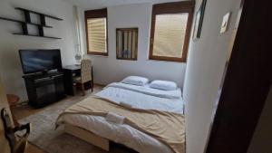 Postel nebo postele na pokoji v ubytování Room near University Campus in Sarajevo - Rooms Sarajevo
