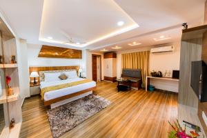 Postel nebo postele na pokoji v ubytování Swosti Palm Resort Gopalpur + 21 fotografií