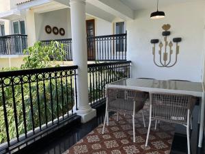 Balkón nebo terasa v ubytování Mayilveedu Guest House
