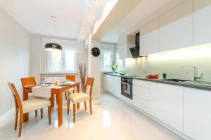 Dapur atau dapur kecil di P&O Apartments Emilii Plater