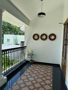 Balkón nebo terasa v ubytování Mayilveedu Guest House