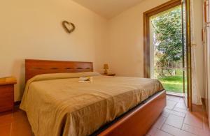 Кровать или кровати в номере Residence LA CANOVA