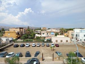 a group of cars parked in a parking lot at Giafra Luxury Rooms in Agrigento