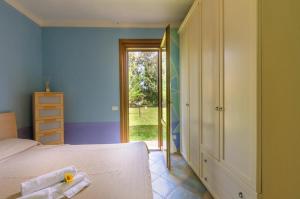 Кровать или кровати в номере Residence LA CANOVA