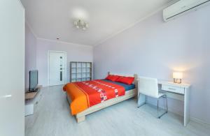 Ένα ή περισσότερα κρεβάτια σε δωμάτιο στο Люкс Армянская 6 ,метро 5 минут ходьбы