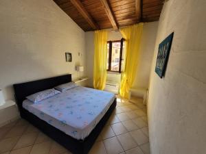 Postel nebo postele na pokoji v ubytování VILLA TRAMONTI SUL MARE + 37 fotografií
