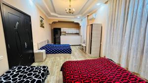 Letto o letti in una camera di Grand Hotel Kobuleti