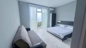 Letto o letti in una camera di Grand Hotel Kobuleti