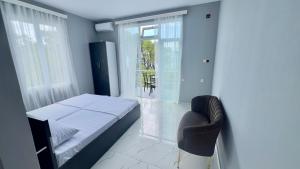 Letto o letti in una camera di Grand Hotel Kobuleti
