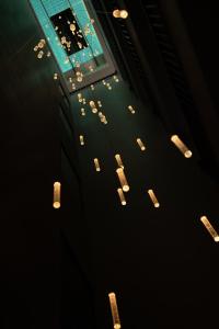 a group of objects flying in the air near a building at Moonlight Boutique Hotel in Hue +57 photos