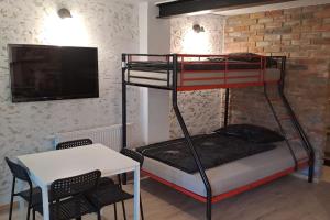 Ένα ή περισσότερα κρεβάτια σε δωμάτιο στο Loft House Noclegi Nysa