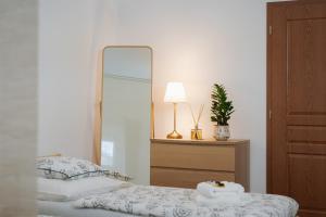 Postelja oz. postelje v sobi nastanitve Apartmán Měšťanský dům