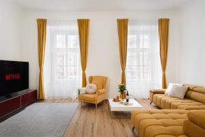 Predel za sedenje v nastanitvi Apartmán Měšťanský dům