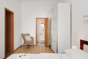 Postelja oz. postelje v sobi nastanitve Apartmán Měšťanský dům