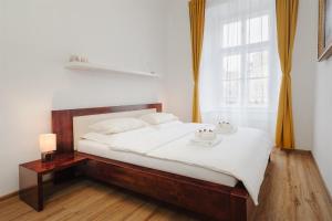 Postelja oz. postelje v sobi nastanitve Apartmán Měšťanský dům