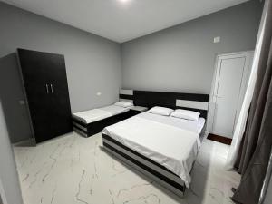 Letto o letti in una camera di Grand Hotel Kobuleti