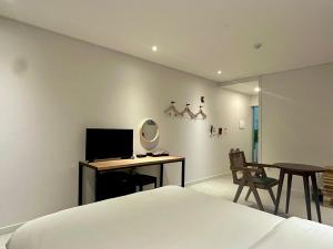 TV a/nebo společenská místnost v ubytování Ciel mini hotel