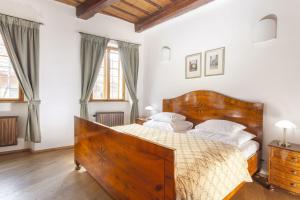 Posteľ alebo postele v izbe v ubytovaní Hotel At the Green Grape