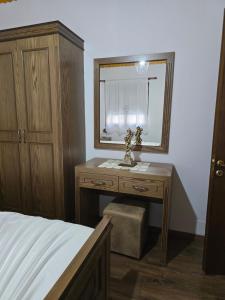 Ένα ή περισσότερα κρεβάτια σε δωμάτιο στο Hazmurat Hotel