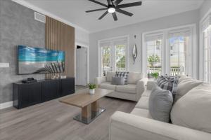 a living room with a couch and a tv at 3 Bedrooms 2 Bathrooms Reunion 7521-104 Md in Kissimmee