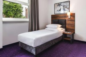 Posteľ alebo postele v izbe v ubytovaní Best Western Plus Hotel Olsztyn Old Town