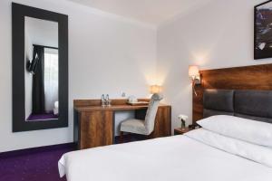 Posteľ alebo postele v izbe v ubytovaní Best Western Plus Hotel Olsztyn Old Town