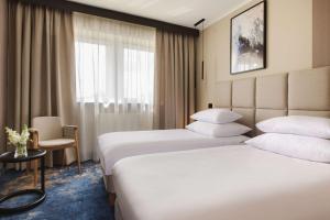 Posteľ alebo postele v izbe v ubytovaní Best Western Plus Hotel Olsztyn Old Town