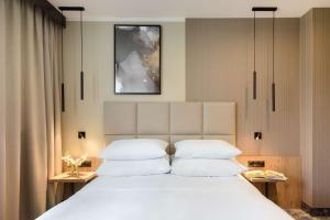 Posteľ alebo postele v izbe v ubytovaní Best Western Plus Hotel Olsztyn Old Town