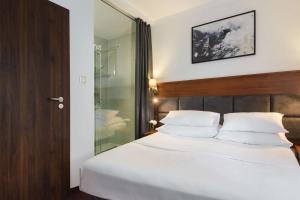 Posteľ alebo postele v izbe v ubytovaní Best Western Plus Hotel Olsztyn Old Town