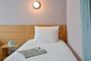 Postel nebo postele na pokoji v ubytování Sure Hotel by Best Western Centre Beaune