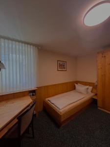 Postel nebo postele na pokoji v ubytování Hotel Rebstock