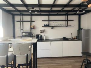 Kuchyň nebo kuchyňský kout v ubytování Apartment Magnolia gallery