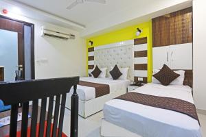 Postel nebo postele na pokoji v ubytování Hotel Smart Inn-Near Delhi Airport