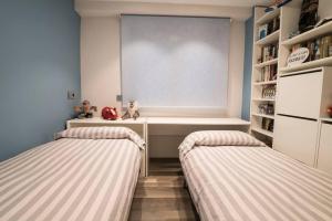 Postel nebo postele na pokoji v ubytování Céntrico y reformado con estilo
