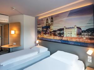 Postel nebo postele na pokoji v ubytování B&B HOTEL Magdeburg-Barleben + 19 fotografií