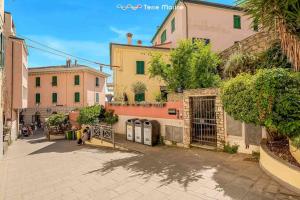 a group of buildings on a city street at Lover's Lane 2, TerreMarine in Riomaggiore