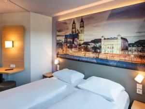 Postel nebo postele na pokoji v ubytování B&B HOTEL Magdeburg-Barleben