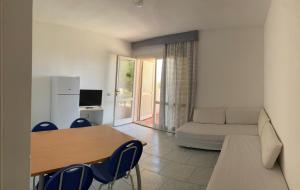 A television and/or entertainment centre at Borgo del Tennis - Sa Ventana 2