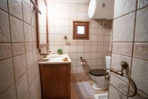 Koupelna v ubytování Kitta Towerhouse + 37 fotografií