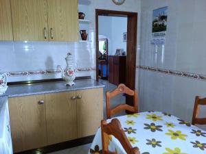 Kuchyň nebo kuchyňský kout v ubytování Casa Brisa do Mar