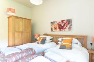 Ένα ή περισσότερα κρεβάτια σε δωμάτιο στο Hillside Lodge, Tor Farm