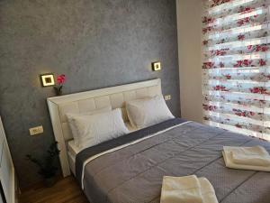 Ένα ή περισσότερα κρεβάτια σε δωμάτιο στο Apartman Andjela