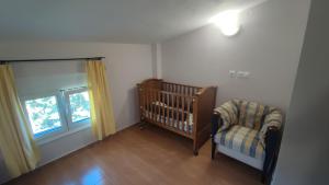 Posteľ alebo postele v izbe v ubytovaní Aliki Serenity Cottage