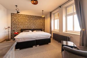 Posteľ alebo postele v izbe v ubytovaní Padre Boutique Hotel