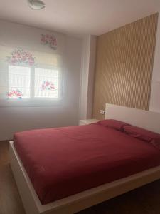 Posteľ alebo postele v izbe v ubytovaní Apartamento Relualhu + 16 fotografií