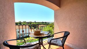 Ein Balkon oder eine Terrasse in der Unterkunft Apartments Villa Tre Marie