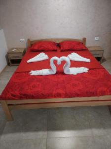 Postel nebo postele na pokoji v ubytování HiT apartmani Pačir 4&5