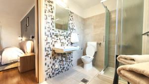 Ein Badezimmer in der Unterkunft Apartments Villa Tre Marie