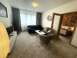 A bed or beds in a room at TATRANSKY DOM sk