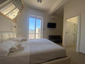 Postel nebo postele na pokoji v ubytování B&B 10 mt dal duomo